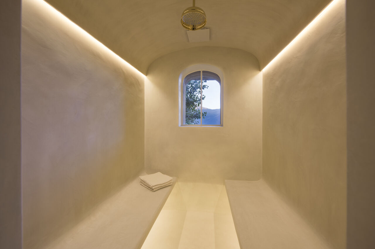 Hammam with window overlooking mountains at Chalet Aline in Verbier