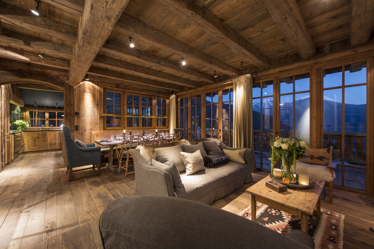 Open plan living, dining and kitchen area at Chalet Aline in Verbier